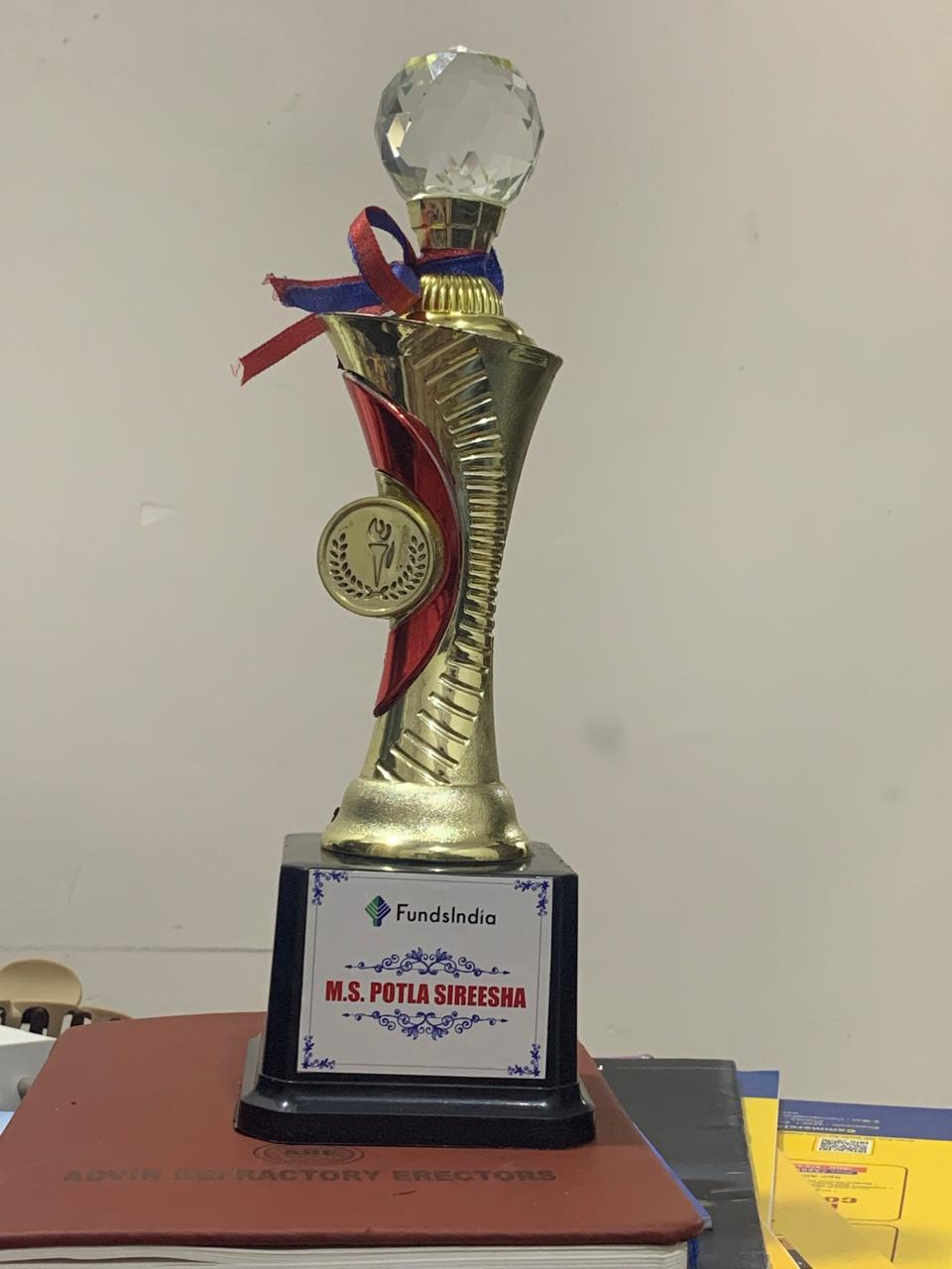 FundsIndia recognition trophy presented to Mrs. Potla Sireesha